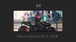 A man with motorbike big mouse pad gaming