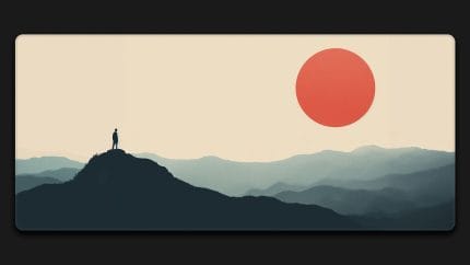 Standing alone on a mountain watching the sunrise desk mats